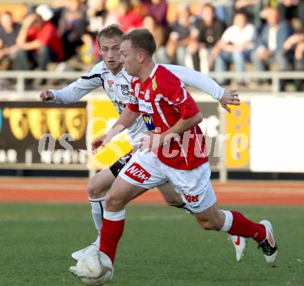 Fussball. Erste Liga.  WAC/St. Andrae gegen SKN St. Poelten. Danijel Micic,  (WAC), Dominik Hofbauer (St. Poelten). Wolfsberg, 2.4.2012. 
Foto: Kuess

---
pressefotos, pressefotografie, kuess, qs, qspictures, sport, bild, bilder, bilddatenbank