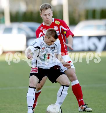 Fussball. Erste Liga.  WAC/St. Andrae gegen SKN St. Poelten. Manuel Kerhe, (WAC), Dominik Hofbauer  (St. Poelten). Wolfsberg, 2.4.2012. 
Foto: Kuess

---
pressefotos, pressefotografie, kuess, qs, qspictures, sport, bild, bilder, bilddatenbank