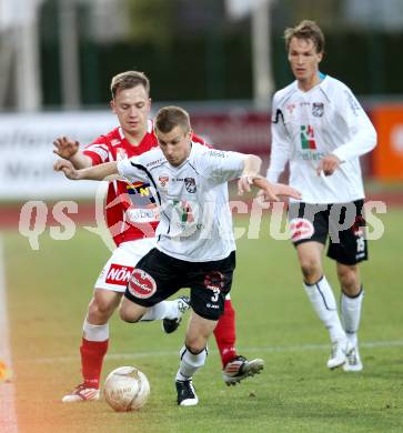 Fussball. Erste Liga.  WAC/St. Andrae gegen SKN St. Poelten. Manuel Kerhe,  (WAC), Dominik Hofbauer (St. Poelten). Wolfsberg, 2.4.2012. 
Foto: Kuess

---
pressefotos, pressefotografie, kuess, qs, qspictures, sport, bild, bilder, bilddatenbank