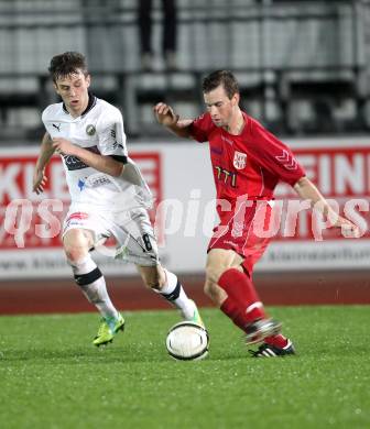 Fussball. Regionalliga.  VSV gegen St. Florian. Daniel Pirker, (VSV), Roland Hinterreiter  (St. Florian). Villach, 5.4.2012. 
Foto: Kuess

---
pressefotos, pressefotografie, kuess, qs, qspictures, sport, bild, bilder, bilddatenbank