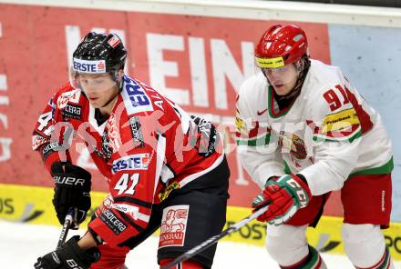 Eishockey Laenderspiel. Oesterreich gegen Weissrussland. Mario Altmann,  (Oesterreich), Sergei Dudko (Weissrussland). Klagenfurt, am 6.4.2012.
Foto: Kuess

---
pressefotos, pressefotografie, kuess, qs, qspictures, sport, bild, bilder, bilddatenbank