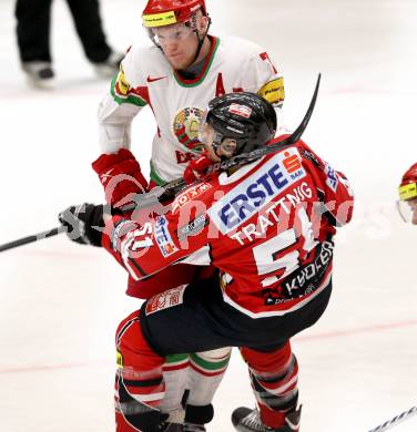 Eishockey Laenderspiel. Oesterreich gegen Weissrussland. Matthias Trattnig, (Oesterreich), Vladimir Denisov (Weissrussland). Klagenfurt, am 6.4.2012.
Foto: Kuess

---
pressefotos, pressefotografie, kuess, qs, qspictures, sport, bild, bilder, bilddatenbank