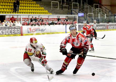 Eishockey Laenderspiel. Oesterreich gegen Weissrussland. Thomas Raffl,  (Oesterreich), Oleg Goroshko (Weissrussland). Klagenfurt, am 6.4.2012.
Foto: Kuess

---
pressefotos, pressefotografie, kuess, qs, qspictures, sport, bild, bilder, bilddatenbank