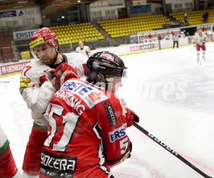 Eishockey Laenderspiel. Oesterreich gegen Weissrussland. Matthias Trattnig, (Oesterreich), Alexander Kitarov (Weissrussland). Klagenfurt, am 6.4.2012.
Foto: Kuess

---
pressefotos, pressefotografie, kuess, qs, qspictures, sport, bild, bilder, bilddatenbank