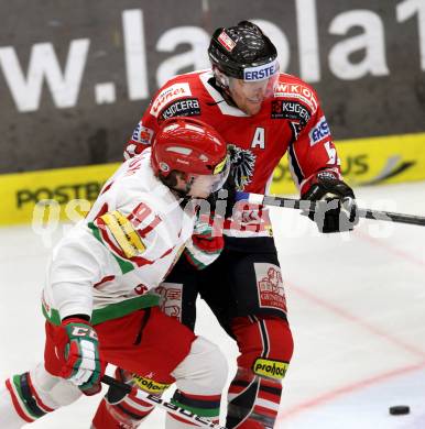 Eishockey Laenderspiel. Oesterreich gegen Weissrussland. Matthias Trattnig, (Oesterreich), Sergei Dudko (Weissrussland). Klagenfurt, am 6.4.2012.
Foto: Kuess

---
pressefotos, pressefotografie, kuess, qs, qspictures, sport, bild, bilder, bilddatenbank