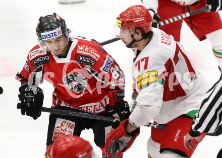 Eishockey Laenderspiel. Oesterreich gegen Weissrussland. Dominique Heinrich,  (Oesterreich), Alexander Kitarov (Weissrussland). Klagenfurt, am 6.4.2012.
Foto: Kuess

---
pressefotos, pressefotografie, kuess, qs, qspictures, sport, bild, bilder, bilddatenbank