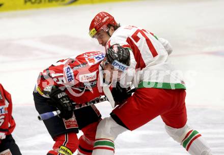 Eishockey Laenderspiel. Oesterreich gegen Weissrussland. Manuel Latusa,  (Oesterreich), Alexander Kitarov (Weissrussland). Klagenfurt, am 6.4.2012.
Foto: Kuess

---
pressefotos, pressefotografie, kuess, qs, qspictures, sport, bild, bilder, bilddatenbank