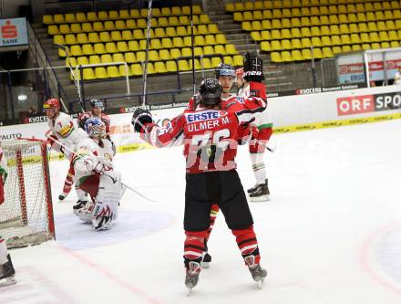 Eishockey Laenderspiel. Oesterreich gegen Weissrussland. Torjubel Thomas Raffl, Martin Ulmer (Oesterreich). Klagenfurt, am 6.4.2012.
Foto: Kuess

---
pressefotos, pressefotografie, kuess, qs, qspictures, sport, bild, bilder, bilddatenbank