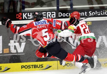 Eishockey Laenderspiel. Oesterreich gegen Weissrussland. Thomas Raffl, (Oesterreich), Oleg Goroshko (Weissrussland). Klagenfurt, am 6.4.2012.
Foto: Kuess

---
pressefotos, pressefotografie, kuess, qs, qspictures, sport, bild, bilder, bilddatenbank