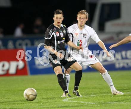 Fussball. Erste Liga.  WAC/St. Andrae gegen SCR Altach. Danijel Micic,  (WAC), Daniel Schoepf (Altach). Wolfsberg, 27.4.2012. 
Foto: Kuess

---
pressefotos, pressefotografie, kuess, qs, qspictures, sport, bild, bilder, bilddatenbank