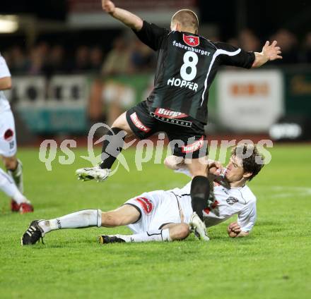 Fussball. Erste Liga.  WAC/St. Andrae gegen SCR Altach. Christian Falk, (WAC), Matthias Hopfer (Altach). Wolfsberg, 27.4.2012. 
Foto: Kuess

---
pressefotos, pressefotografie, kuess, qs, qspictures, sport, bild, bilder, bilddatenbank