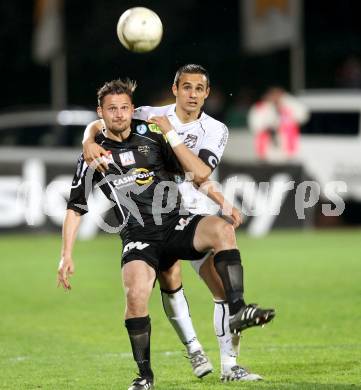 Fussball. Erste Liga.  WAC/St. Andrae gegen SCR Altach. Nenad Jovanovic, (WAC), Patrick Scherrer (Altach). Wolfsberg, 27.4.2012. 
Foto: Kuess

---
pressefotos, pressefotografie, kuess, qs, qspictures, sport, bild, bilder, bilddatenbank