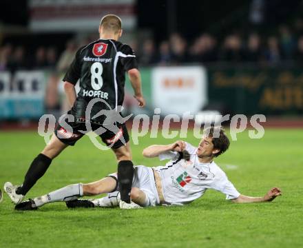 Fussball. Erste Liga.  WAC/St. Andrae gegen SCR Altach. Christian Falk, (WAC), Matthias Hopfer (Altach). Wolfsberg, 27.4.2012. 
Foto: Kuess

---
pressefotos, pressefotografie, kuess, qs, qspictures, sport, bild, bilder, bilddatenbank