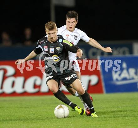 Fussball. Erste Liga.  WAC/St. Andrae gegen SCR Altach. Roland Putsche, (WAC), Philipp Hoermann (Altach). Wolfsberg, 27.4.2012. 
Foto: Kuess

---
pressefotos, pressefotografie, kuess, qs, qspictures, sport, bild, bilder, bilddatenbank