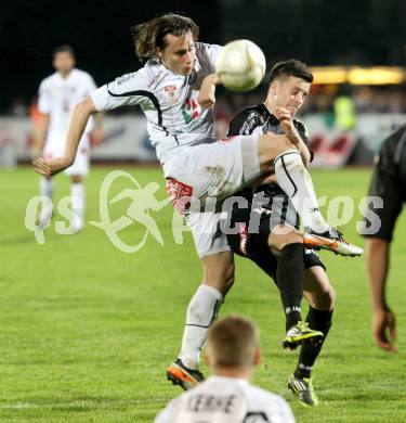 Fussball. Erste Liga.  WAC/St. Andrae gegen SCR Altach. Dario Baldauf (WAC), Daniel Schoepf (Altach). Wolfsberg, 27.4.2012. 
Foto: Kuess

---
pressefotos, pressefotografie, kuess, qs, qspictures, sport, bild, bilder, bilddatenbank