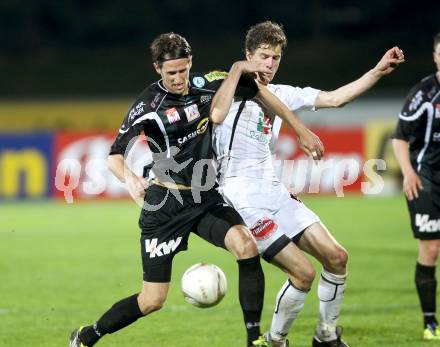 Fussball. Erste Liga.  WAC/St. Andrae gegen SCR Altach. Christian Falk,  (WAC), Christoph Schoesswendter (Altach). Wolfsberg, 27.4.2012. 
Foto: Kuess

---
pressefotos, pressefotografie, kuess, qs, qspictures, sport, bild, bilder, bilddatenbank