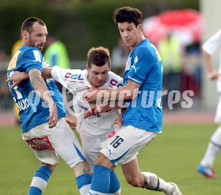 Fussball Regionalliga. VSV gegen Vorwaerts Steyr. Rok Pavlicic, Andreas Dlopst,  (VSV), Daniel Kerschbaumer (Steyr). Villach, 28.4.2012.
Foto: Kuess
---
pressefotos, pressefotografie, kuess, qs, qspictures, sport, bild, bilder, bilddatenbank