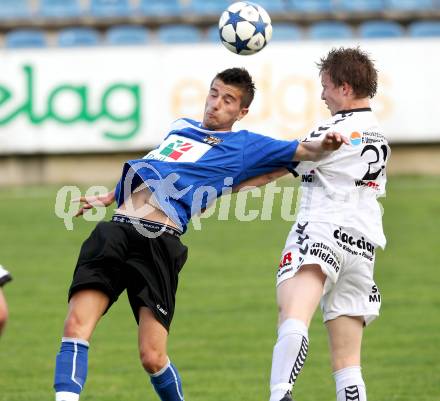 Fussball Kaerntner Liga. Feldkirchen gegen WAC/St. Andrae. Marco Huber,  (Feldkirchen), Hrvoje Jakovljevic (WAC). Feldkirchen, 1.5.2012.
Foto: Kuess
---
pressefotos, pressefotografie, kuess, qs, qspictures, sport, bild, bilder, bilddatenbank