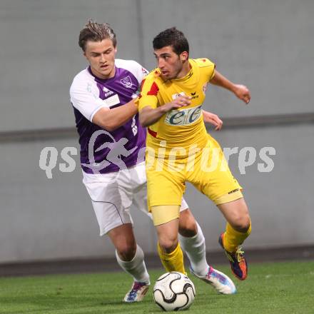 Fussball Regionalliga. SK Austria Klagenfurt gegen Kapfenberger SV Amateure. Michael Tschemernjak, (Austria Klagenfurt), Bingöl Ibrahim (Kapfenberger SV).  Klagenfurt, 4.5.2012
Foto: Kuess

---
pressefotos, pressefotografie, kuess, qs, qspictures, sport, bild, bilder, bilddatenbank