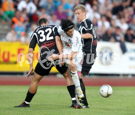 Fussball. Erste Liga.  WAC/St. Andrae gegen TSV Hartberg. Jacobo, (WAC), Matej Miljatovic, Michael Huber  (Hartberg). Wolfsberg, 8.5.2012. 
Foto: Kuess

---
pressefotos, pressefotografie, kuess, qs, qspictures, sport, bild, bilder, bilddatenbank