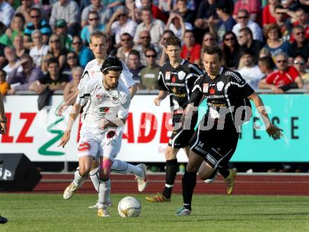Fussball. Erste Liga.  WAC/St. Andrae gegen TSV Hartberg. Jacobo, (WAC), Manuel Prietl (Hartberg). Wolfsberg, 8.5.2012. 
Foto: Kuess

---
pressefotos, pressefotografie, kuess, qs, qspictures, sport, bild, bilder, bilddatenbank