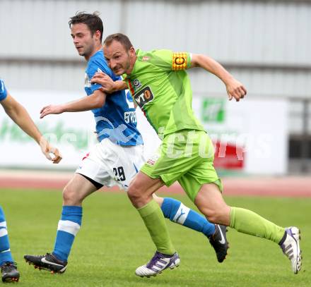 Fussball Regionalliga. VSV gegen Wels FC. Patrick Striednig,  (VSV), Andreas Feichtinger (Wels). Villach, 1.6.2012.
Foto: Kuess
---
pressefotos, pressefotografie, kuess, qs, qspictures, sport, bild, bilder, bilddatenbank