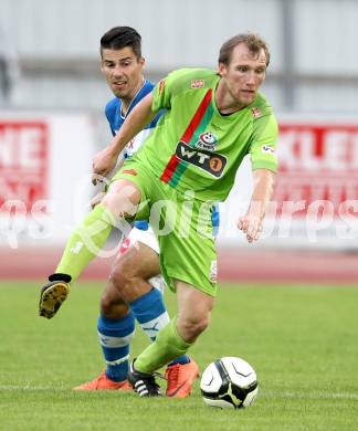 Fussball Regionalliga. VSV gegen Wels FC. Sandro Ebner, (VSV), Thomas Winkler (Wels). Villach, 1.6.2012.
Foto: Kuess
---
pressefotos, pressefotografie, kuess, qs, qspictures, sport, bild, bilder, bilddatenbank