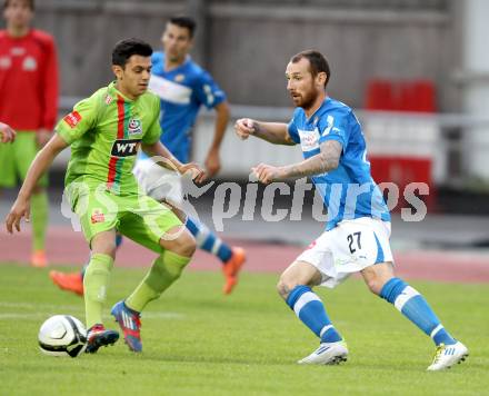 Fussball Regionalliga. VSV gegen Wels FC. Rok Pavlicic, (VSV), Bayram Gas (Wels). Villach, 1.6.2012.
Foto: Kuess
---
pressefotos, pressefotografie, kuess, qs, qspictures, sport, bild, bilder, bilddatenbank