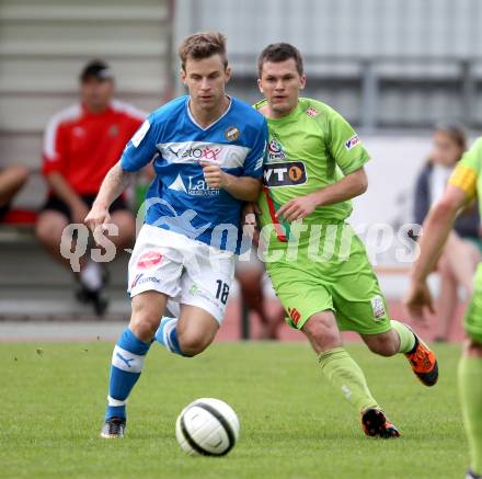 Fussball Regionalliga. VSV gegen Wels FC. Daniel Pirker, (VSV), Michael Lebersorg (Wels). Villach, 1.6.2012.
Foto: Kuess
---
pressefotos, pressefotografie, kuess, qs, qspictures, sport, bild, bilder, bilddatenbank