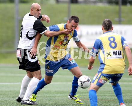 Fussball KFV Cup. Finale. SV Spittal gegen Kraig. Senad Tiganj,  (Spittal), Christoph Fruehstueck (Kraig). Spittal, 6.6.2012.
Foto: Kuess
---
pressefotos, pressefotografie, kuess, qs, qspictures, sport, bild, bilder, bilddatenbank