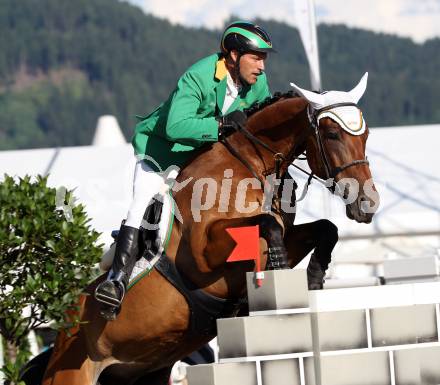 Springreiten. Staatsmeisterschaft Mannschaft. Gerfried Puck. Treffen, am 22.6.2012.
Foto: Kuess

---
pressefotos, pressefotografie, kuess, qs, qspictures, sport, bild, bilder, bilddatenbank