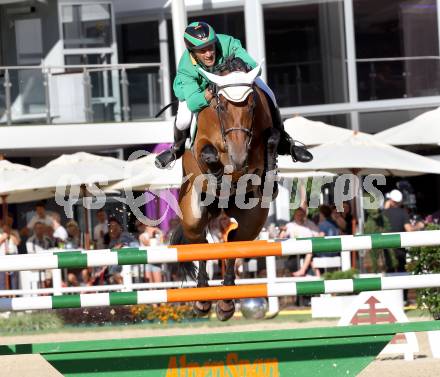 Springreiten. Staatsmeisterschaft Mannschaft. Gerfried Puck. Treffen, am 22.6.2012.
Foto: Kuess

---
pressefotos, pressefotografie, kuess, qs, qspictures, sport, bild, bilder, bilddatenbank