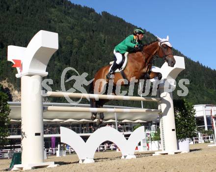 Springreiten. Staatsmeisterschaft Mannschaft. Gerfried Puck. Treffen, am 22.6.2012.
Foto: Kuess

---
pressefotos, pressefotografie, kuess, qs, qspictures, sport, bild, bilder, bilddatenbank