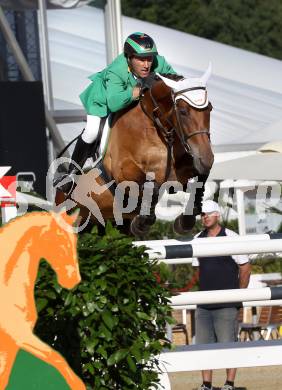 Springreiten. Staatsmeisterschaft Mannschaft. Gerfried Puck. Treffen, am 22.6.2012.
Foto: Kuess

---
pressefotos, pressefotografie, kuess, qs, qspictures, sport, bild, bilder, bilddatenbank