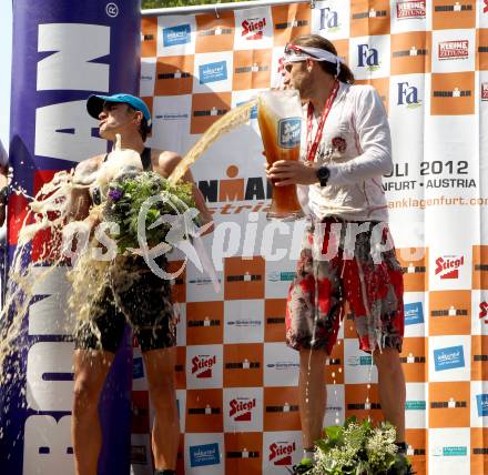 Ironman Austria. Schwimmen, Radfahren, Laufen. Daniel Fontana (ITA), Faris Al-Sultan (GER). Klagenfurt, 1.7.2012
Foto: Kuess

---
pressefotos, pressefotografie, kuess, qs, qspictures, sport, bild, bilder, bilddatenbank