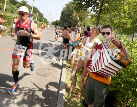 Ironman Austria. Schwimmen, Radfahren, Laufen. Klagenfurt, 1.7.2012
Foto: Kuess

---
pressefotos, pressefotografie, kuess, qs, qspictures, sport, bild, bilder, bilddatenbank