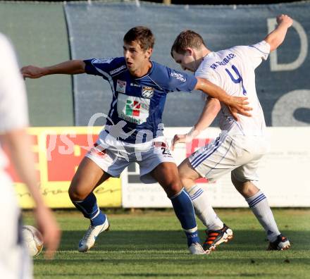 Fussball Testspiel. Treibach gegen RZ Pellets WAC.  Philip Klaming,  (Treibach), Mihret Topcagic (WAC). Treibach, 6.7.2012.
Foto: Kuess
---
pressefotos, pressefotografie, kuess, qs, qspictures, sport, bild, bilder, bilddatenbank