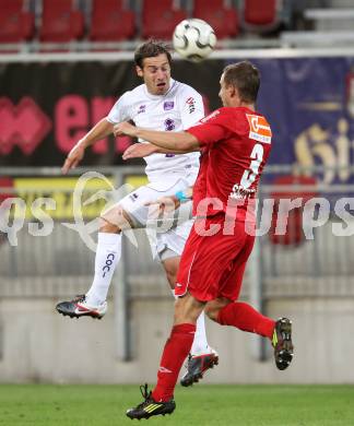 Fussball OEFB Cup. SK Austria Klagenfurt gegen SV Horn. Marc Sand,  (Austria), Peter Sedivy (Horn). Klagenfurt, am 13.7.2012.
Foto: Kuess
---
pressefotos, pressefotografie, kuess, qs, qspictures, sport, bild, bilder, bilddatenbank