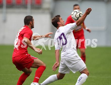 Fussball OEFB Cup. SK Austria Klagenfurt gegen SV Horn. Grega Triplat (Austria), Marco Salvatore (Horn). Klagenfurt, am 13.7.2012.
Foto: Kuess
---
pressefotos, pressefotografie, kuess, qs, qspictures, sport, bild, bilder, bilddatenbank