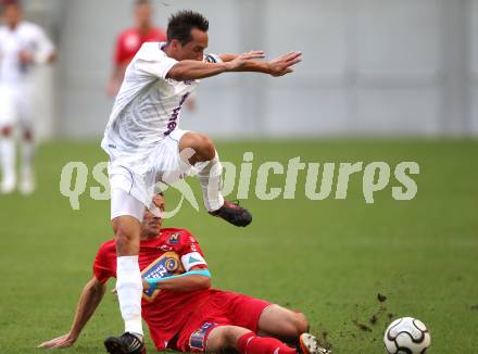 Fussball OEFB Cup. SK Austria Klagenfurt gegen SV Horn. Matthias Dollinger (Austria), Aleksandar Djordjevic (Horn). Klagenfurt, am 13.7.2012.
Foto: Kuess
---
pressefotos, pressefotografie, kuess, qs, qspictures, sport, bild, bilder, bilddatenbank