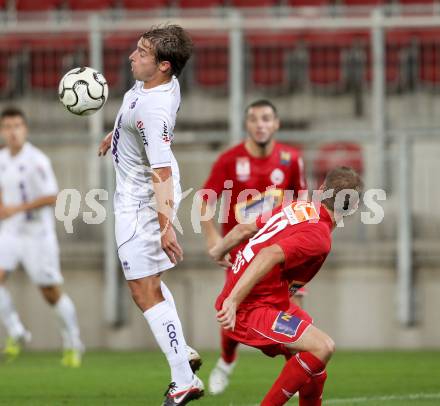 Fussball OEFB Cup. SK Austria Klagenfurt gegen SV Horn. Marc Sand, (Austria), Thomas Friess  (Horn). Klagenfurt, am 13.7.2012.
Foto: Kuess
---
pressefotos, pressefotografie, kuess, qs, qspictures, sport, bild, bilder, bilddatenbank