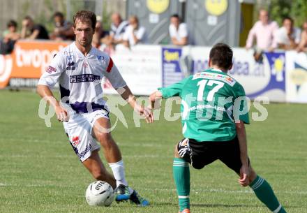 Fussball OEFB Cup. SAK gegen TSV St. Johann/Pongau. Marjan Kropiunik, (SAK), Thomas Klammer  (St.Johann). Klagenfurt, 14.7.2012.
Foto: Kuess
---
pressefotos, pressefotografie, kuess, qs, qspictures, sport, bild, bilder, bilddatenbank