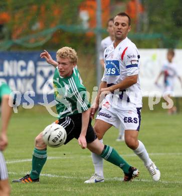 Fussball OEFB Cup. SAK gegen TSV St. Johann/Pongau. Goran Jolic,  (SAK), Thomas Maier (St.Johann). Klagenfurt, 14.7.2012.
Foto: Kuess
---
pressefotos, pressefotografie, kuess, qs, qspictures, sport, bild, bilder, bilddatenbank