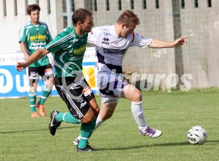 Fussball OEFB Cup. SAK gegen TSV St. Johann/Pongau. Darijo Biscan,  (SAK), Roman Hupf (St.Johann). Klagenfurt, 14.7.2012.
Foto: Kuess
---
pressefotos, pressefotografie, kuess, qs, qspictures, sport, bild, bilder, bilddatenbank