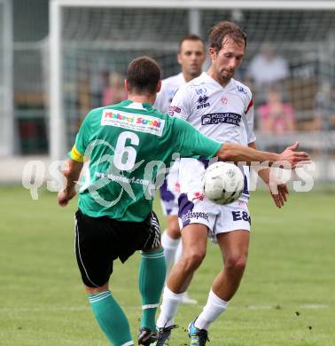 Fussball OEFB Cup. SAK gegen TSV St. Johann/Pongau. Marjan Kropiunik,  (SAK), Roman Hupf (St.Johann). Klagenfurt, 14.7.2012.
Foto: Kuess
---
pressefotos, pressefotografie, kuess, qs, qspictures, sport, bild, bilder, bilddatenbank