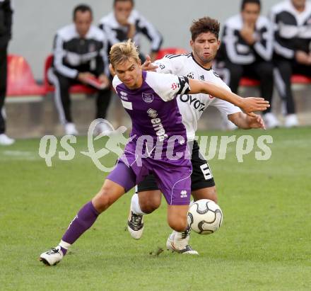 Fussball Testspiel. SK Austria Klagenfurt gegen Besiktas Istanbul. Peter Pucker,  (Austria), Tanju Kayhan (Besiktas). Klagenfurt, am 16.7.2012.
Foto: Kuess
---
pressefotos, pressefotografie, kuess, qs, qspictures, sport, bild, bilder, bilddatenbank