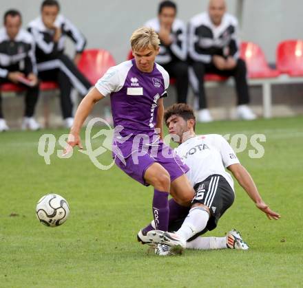 Fussball Testspiel. SK Austria Klagenfurt gegen Besiktas Istanbul. Peter Pucker,  (Austria), Tanju Kayhan (Besiktas). Klagenfurt, am 16.7.2012.
Foto: Kuess
---
pressefotos, pressefotografie, kuess, qs, qspictures, sport, bild, bilder, bilddatenbank