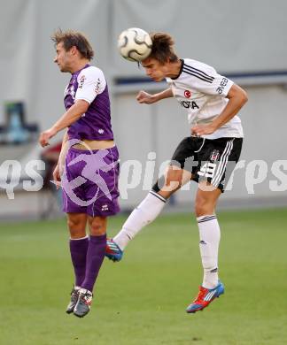 Fussball Testspiel. SK Austria Klagenfurt gegen Besiktas Istanbul. Marc Sand,  (Austria), Atinc Nukan (Besiktas). Klagenfurt, am 16.7.2012.
Foto: Kuess
---
pressefotos, pressefotografie, kuess, qs, qspictures, sport, bild, bilder, bilddatenbank