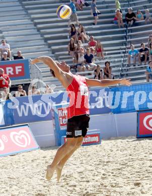 Beachvolleyball Grand Slam. Thomas Kunert (AUT). Klagenfurt, 18.7.2012
Foto: Kuess

---
pressefotos, pressefotografie, kuess, qs, qspictures, sport, bild, bilder, bilddatenbank