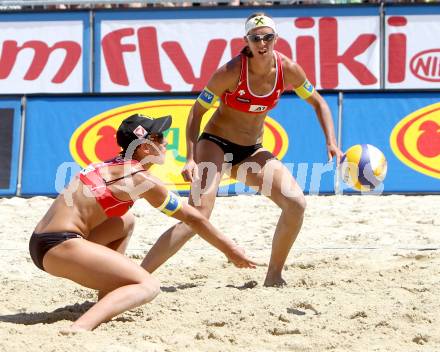 Beachvolleyball Grand Slam.  Doris Schwaiger, Stefanie Schwaiger (AUT). Klagenfurt, 18.7.2012
Foto: Kuess

---
pressefotos, pressefotografie, kuess, qs, qspictures, sport, bild, bilder, bilddatenbank